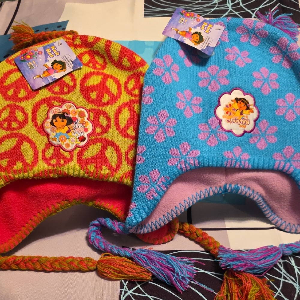 2 Dora The Explorer Knit Tassel Hats, NWT, Peace Sign & Sunshiny Day, Pink& Blue